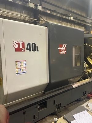 2013 HAAS ST-40-L CNC LATHE(2AXIS) | Tight Tolerance Machinery