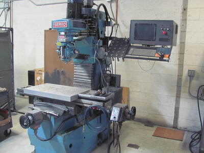 2004 Servo Products Company CNC Knee Mill Vertical Machining Centers | Tight Tolerance Machinery
